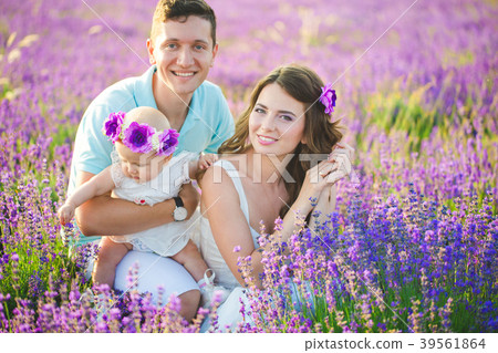 Young family in a lavender field Young family in a lavender field 39561864