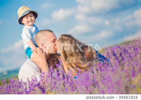 Young family in a lavender field Young family in a lavender field 39561928