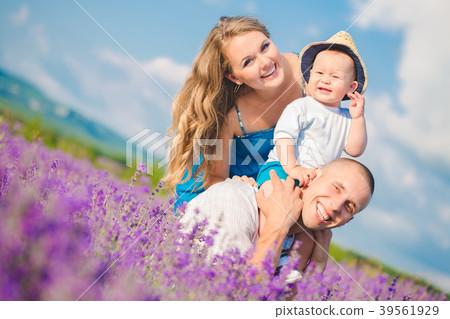 Young family in a lavender field Young family in a lavender field 39561929