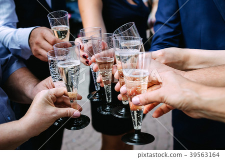 clinking glasses of champagne clinking glasses of champagne 39563164