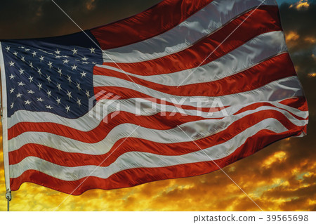 American flag flying, over beautiful Sunset  39565698