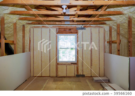 Insulation of attic with fiberglass cold barrier 39566160