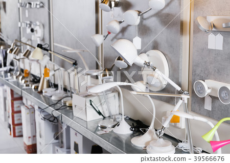 Image of various designer desk lamp in the furniture shop 39566676