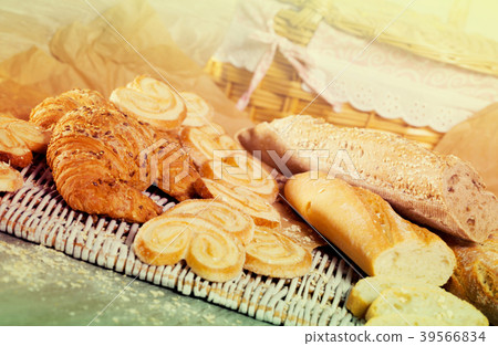 Various kinds of bread and bakery products on table Various kinds of bread and bakery products on table 39566834