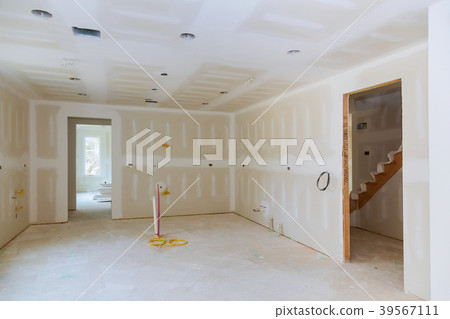 Drywall is hung in kitchen room remodeling project Drywall is hung in kitchen room remodeling project 39567111