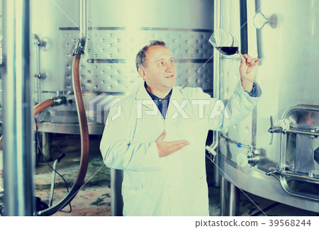 Mature male with glass of wine 39568244