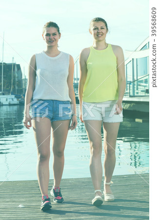 young girls standing on berthand and smiling young girls standing on berthand and smiling 39568609