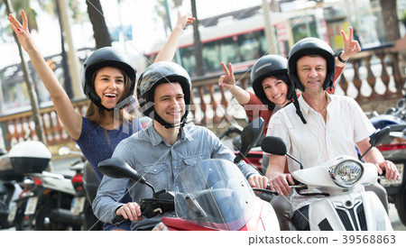 parents and children on scooters parents and children on scooters 39568863