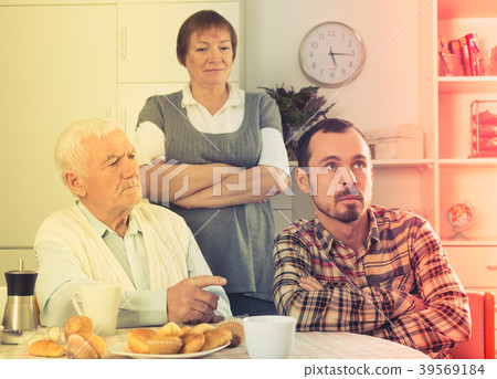 Grandfather teaches grandson 39569184