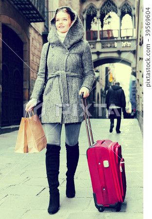 female with baggage in hood female with baggage in hood 39569604