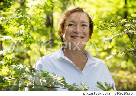 Portrait of elderly woman who smiles 39569839