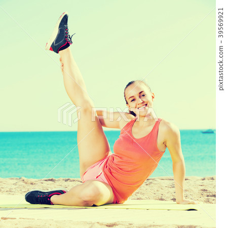woman working out in beach 39569921