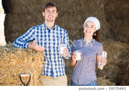 couple in the hay with milk 39570465