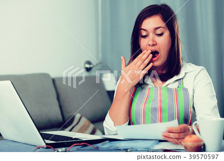 Housewife searching for recipes Housewife searching for recipes 39570597