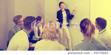 students attentively listening to lecture 39570665