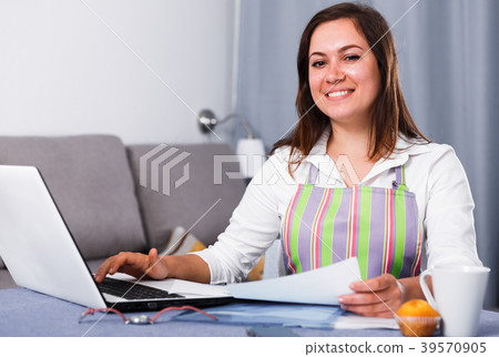 Housewife searching for recipes 39570905