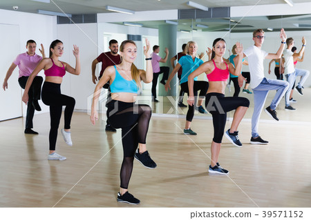People of different ages dancing in dance school 39571152