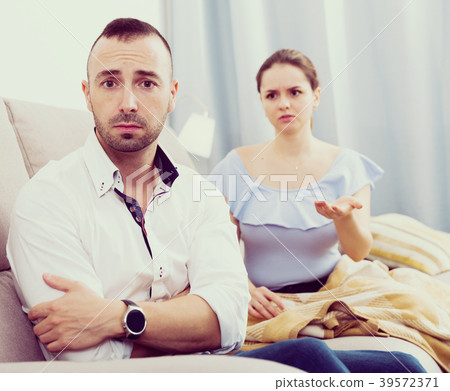 Man is upset because he quarrel with his wife 39572371