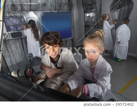 Children playing in bunker quest room Children playing in bunker quest room 39572402