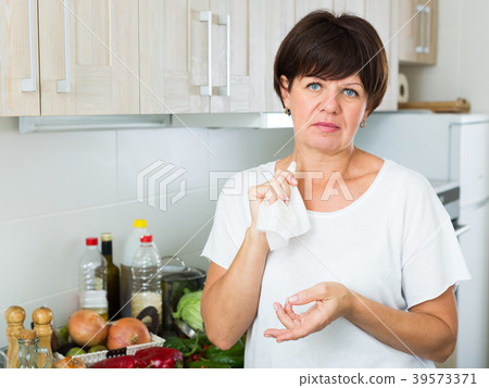 sad mature woman 39573371