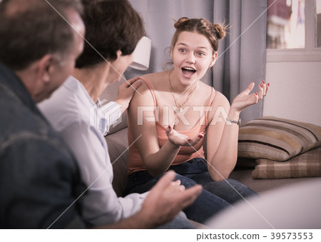 Happy family is talking about life on the sofa Happy family is talking about life on the sofa 39573553