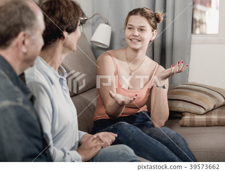 Happy family is talking about life on the sofa 39573662