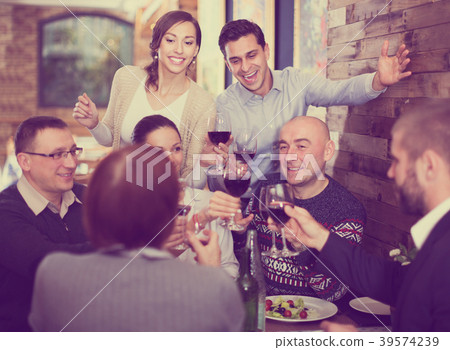Company celebrating in restaurant Company celebrating in restaurant 39574239