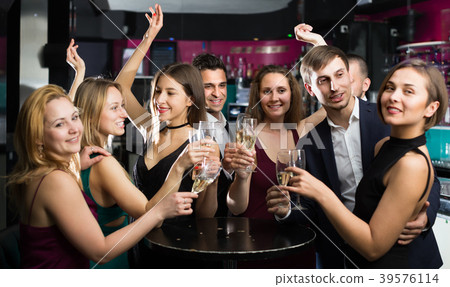 Smiling colleagues dancing with cocktails Smiling colleagues dancing with cocktails 39576114