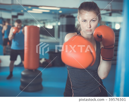 Woman boxing in gym Woman boxing in gym 39576301