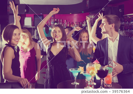 Students dancing on night party Students dancing on night party 39576364