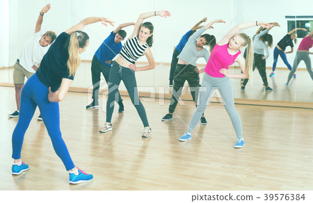 Teens in dance hall Teens in dance hall 39576384