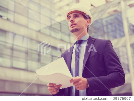 Professional man in jacket and helmet 39576907