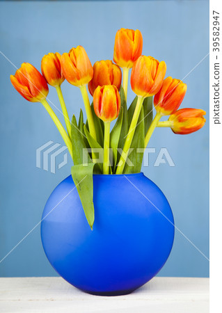 Tulips in a blue vase Tulips in a blue vase 39582947