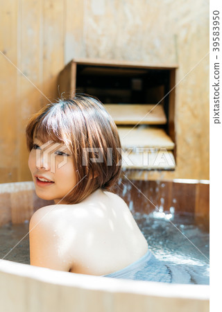 Onsen series: Asian woman taking a bath Onsen series: Asian woman taking a bath 39583950
