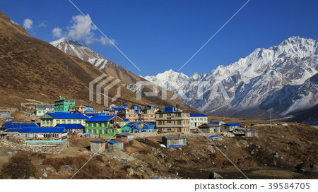 Village Kyanjin Gumba and mountains Tserko Ri. 39584705