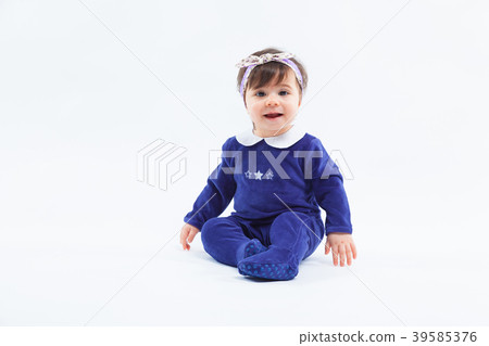 Little cute adorable smiling girl with bow in hair Little cute adorable smiling girl with bow in hair 39585376