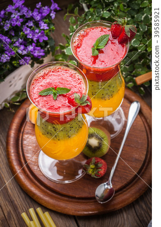 Smoothies with fresh fruit. 39585921