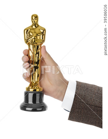 Hand with Award of Oscar ceremony 39586016