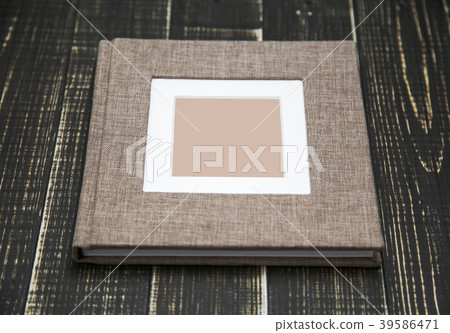 family photo album isolated on wooden background family photo album isolated on wooden background 39586471