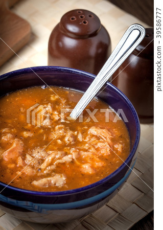 Traditional polish tripe soup with vegetables. Traditional polish tripe soup with vegetables. 39586777
