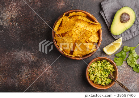 Mexican food concept. Nachos - yellow corn totopos Mexican food concept. Nachos - yellow corn totopos 39587406