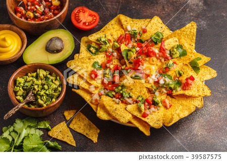 Mexican food concept. Nachos with sauces Mexican food concept. Nachos with sauces 39587575