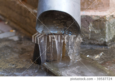 Frozen Icicles from the Downspout 39587724