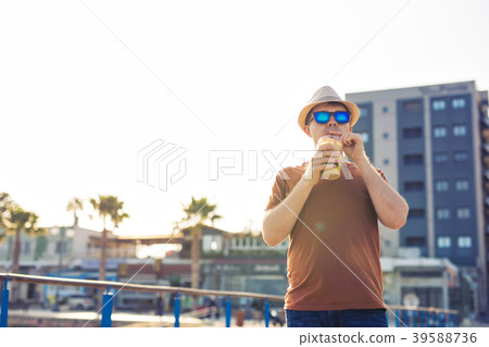 lifestyle, drinks and people concept - man in lifestyle, drinks and people concept - man in 39588736