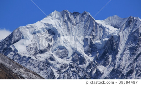 Glacier covering parts of mount Gangchenpo. 39594487