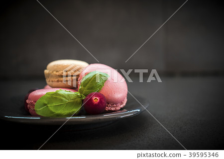 Sweet macaroons or macarons with cranberry and 39595346