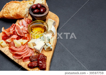 Meat and cheese plate with salami sausage, chorizo 39597759