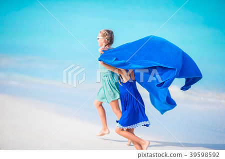 Little girls having fun enjoying vacation on 39598592