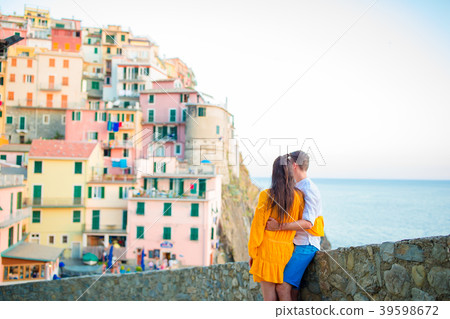 Happy couple background stunning village of 39598672