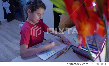 Little girl paint painting at table . schoolgirls 39601031
